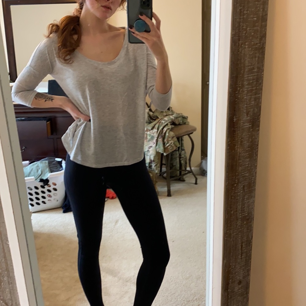 Quarter sleeve grey shirt.
